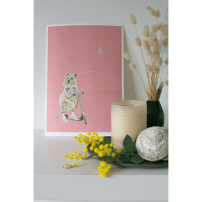 An Art print of a quokka riding a scooter on Rottnest Island, Western Australia. Styled in an Australiana themed kids bedroom. Created by Good Art.