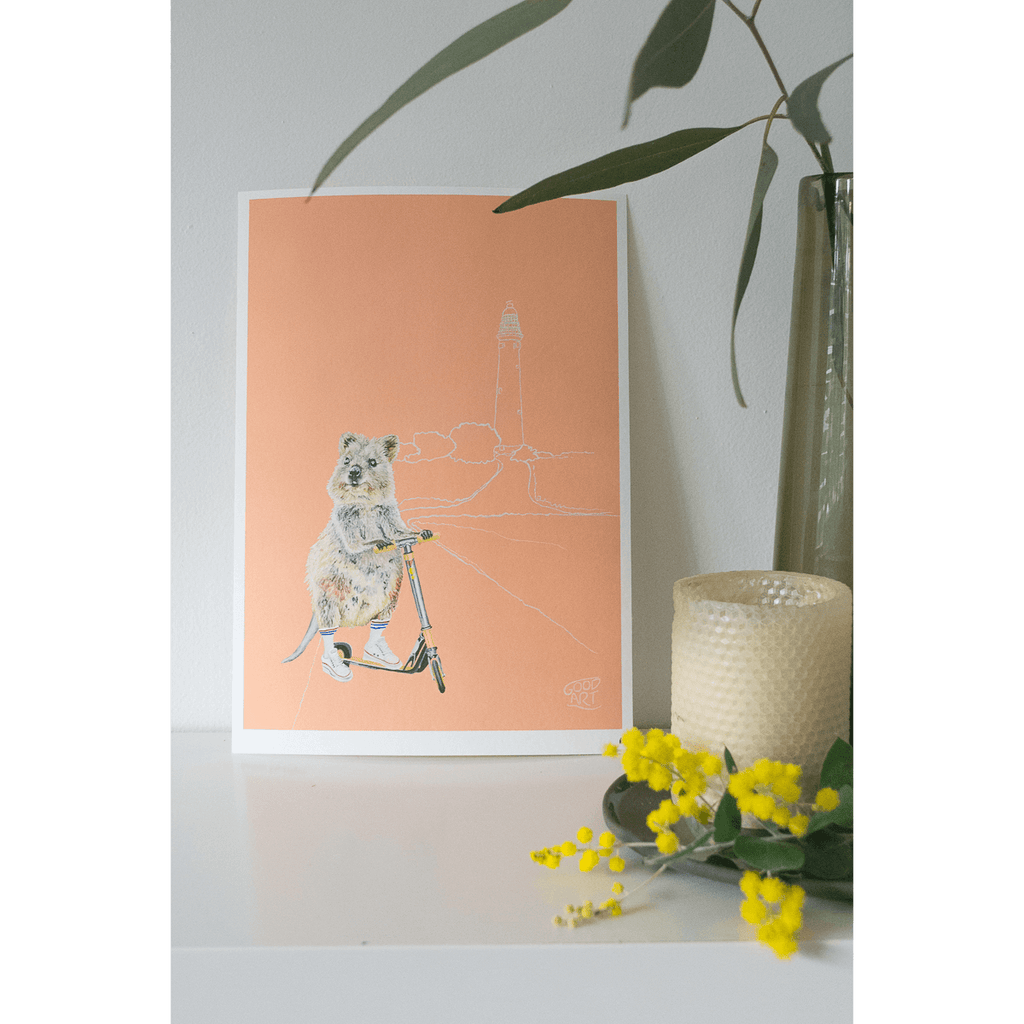 Rottnest Island Quokka, childrens wall art by Good Art prints. The Quokka is riding a scooter. Apricot coloured background. Styled in an Australiana themed bedroom.