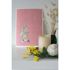 An Art print of a quokka riding a scooter on Rottnest Island, Western Australia. Styled in an Australiana themed kids bedroom. Created by Good Art.