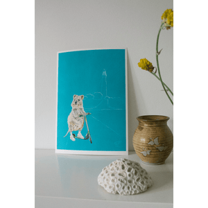 A print of the iconic Australian Quokka. The Quokka is riding a scooter. The background is predominately aqua. Painted by artist Jaelle Pedroli of Good Art. Styled in an Australian themed kids bedroom.